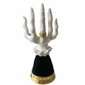 Skeleton hand candle holder