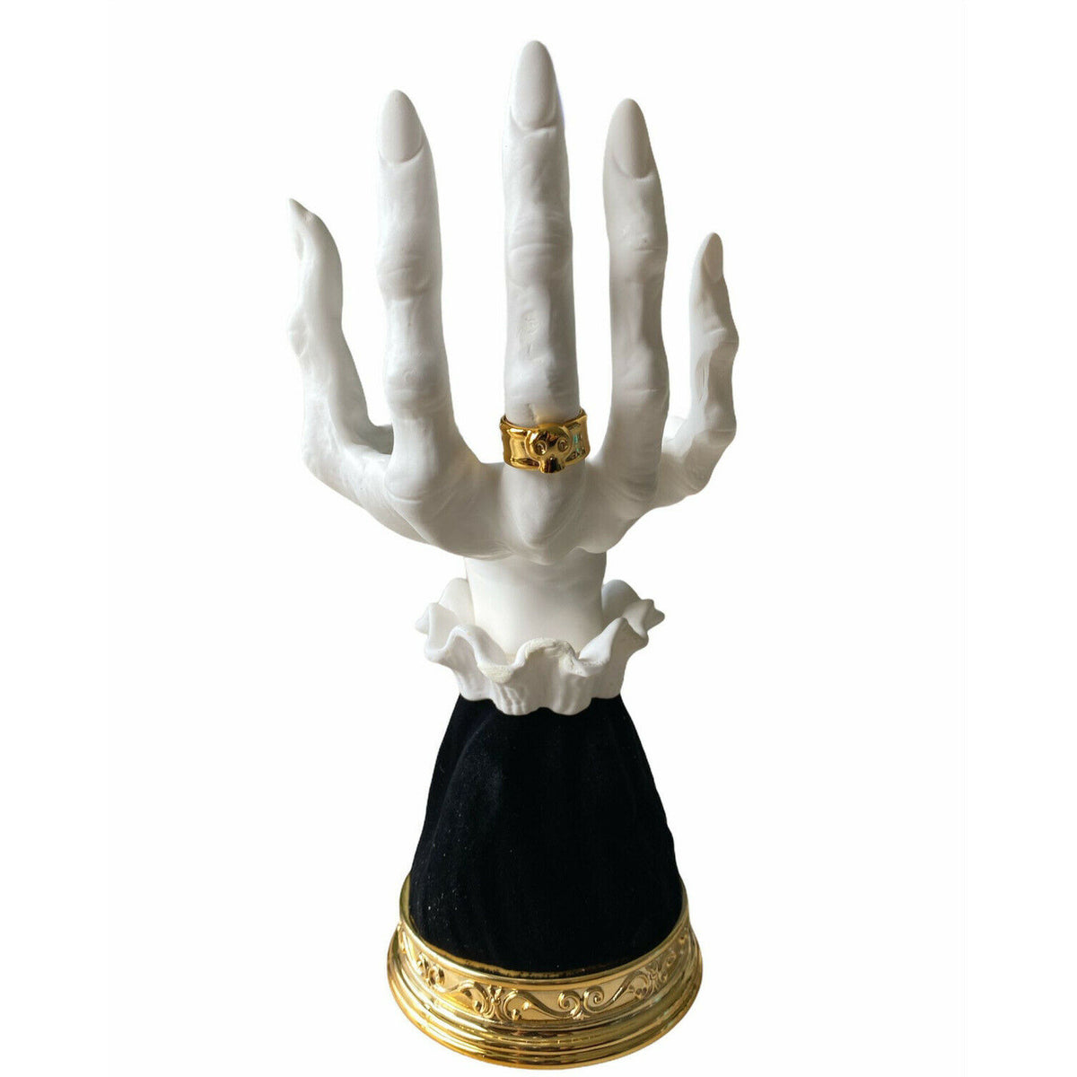 Skeleton hand candle holder