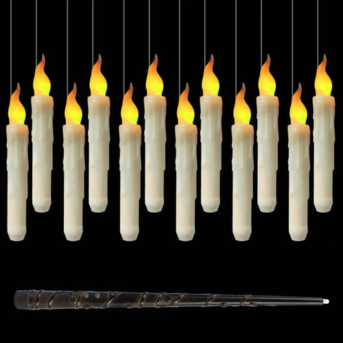 Floating LED candles glowing against a dark background