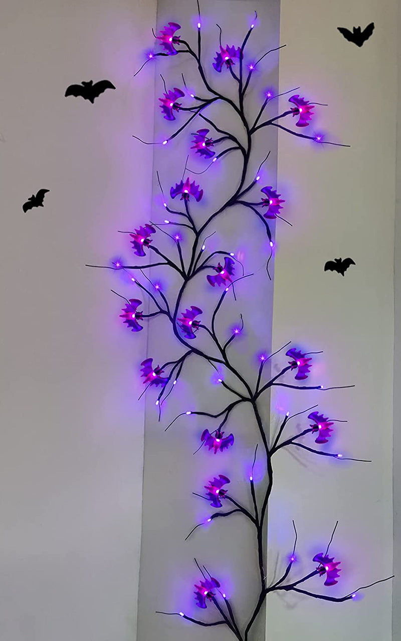 Bat vine lights running up a doorframe