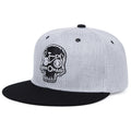 Grey snapback with embroidered skull patch