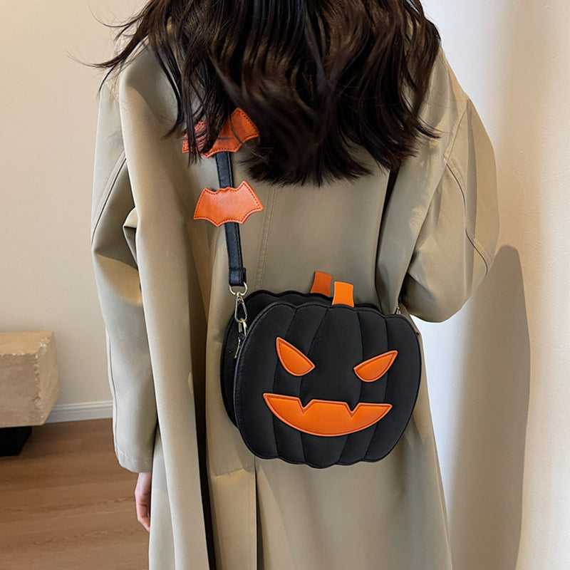 Black jack-o'-lantern crossbody bag being worn