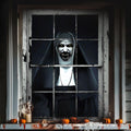 Haunted window cover on a house window